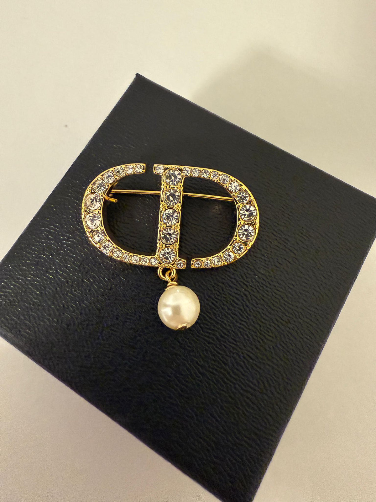 CD parel broche